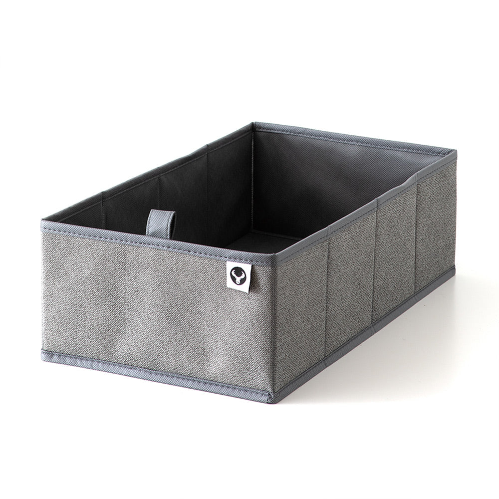 Graue Schubladenbox mit Ziehlasche und New Swedish Design Logo für die Malm Kommode.