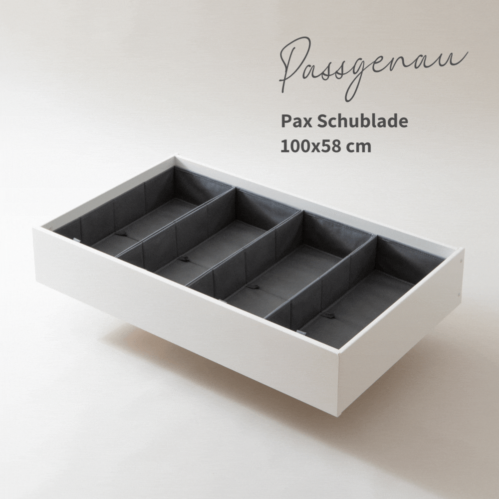Weiße Schublade für den IKEA Pax Kleiderschrank, die mit 4 grauen Schubladen Organizern gefüllt ist.