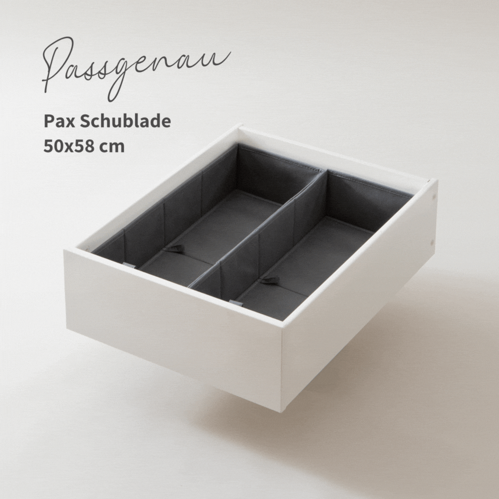 Eine weiße, mit 2 Schubladen Organizern gefüllte, 50 cm breite Schublade für den Pax Kleiderschrank von IKEA.