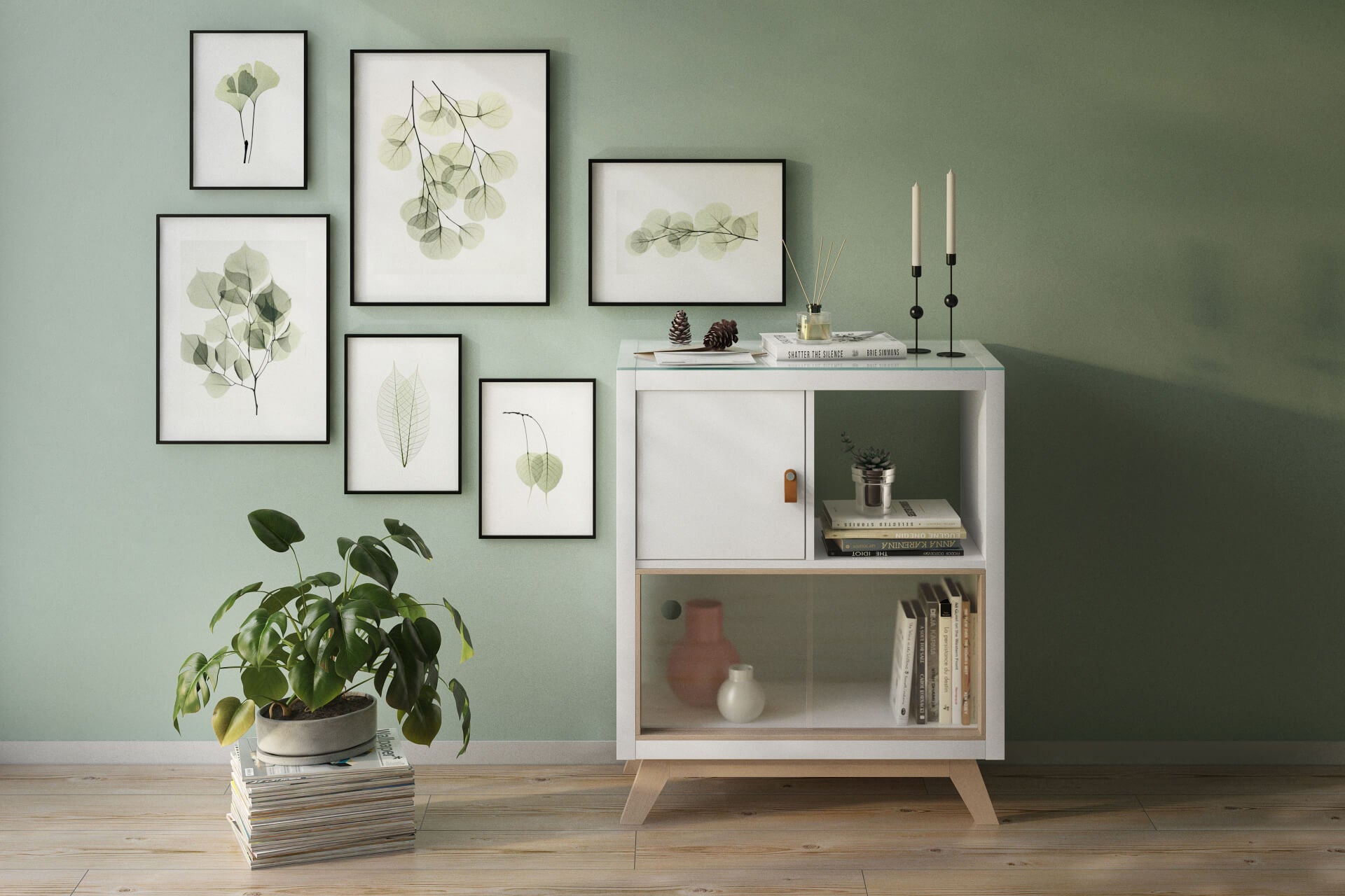 Ein weißes Kallax, 2 Fächer breit, wurde mit einem Untergestell aus Holz, einer Glasplatte und z verschiedenen Türen gepimpt. Das Regal steht vor einer grünen Wand.