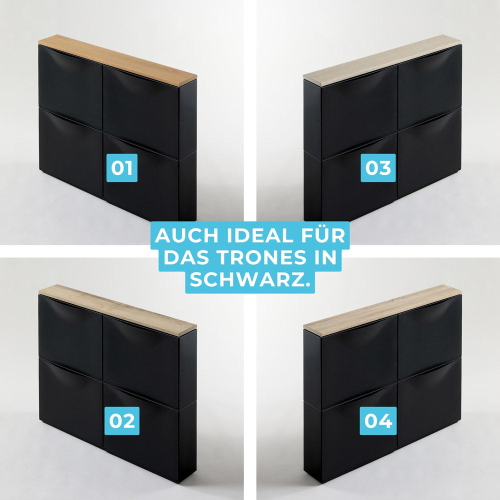 Trones Holzplatte aus Eiche Dekor auf einem schwarzen Schuhschrank.