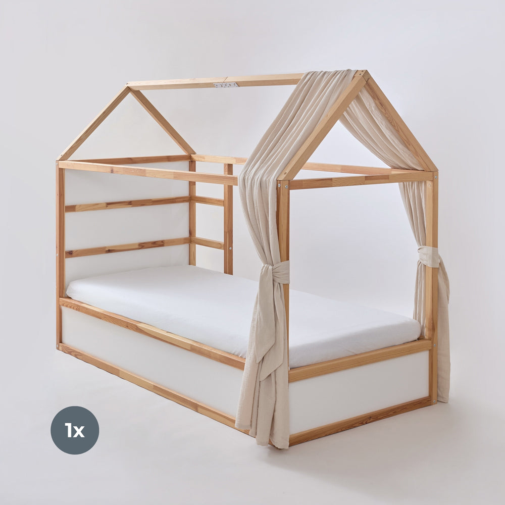 IKEA Kura Kinderbett mit Dach und Baldachin aus Musselin in Beige.